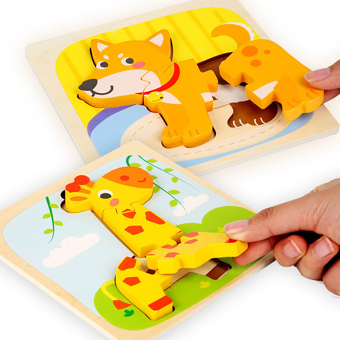 baby playing with sensory toy