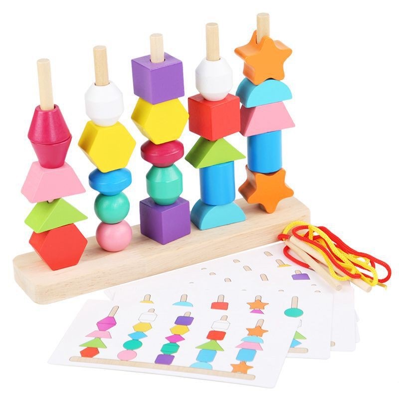 A toddler's hands grasping a chunky wooden puzzle piece.