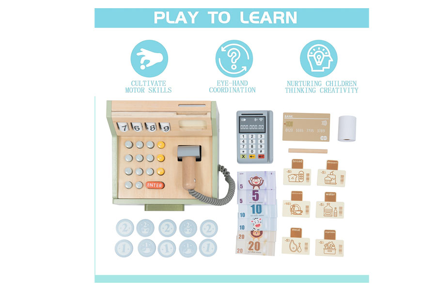 A close-up of a child's hands pressing the wooden buttons on a toy cash register