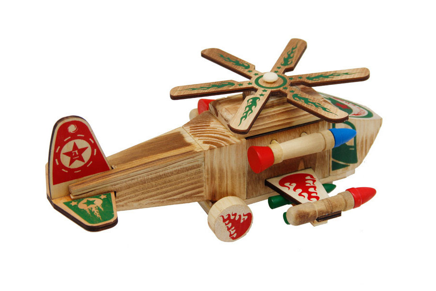 A close-up of a smooth, rounded wing edge on a wooden plane, highlighting its safe construction.