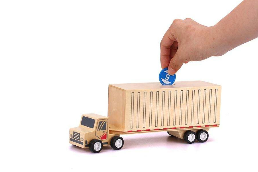 A close-up shot of the smooth, rounded edges of a high-quality wooden toy car.