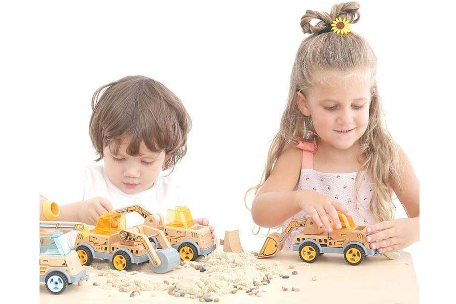 A collection of simple, beautifully crafted wooden cars, trucks, and an airplane on a white background.