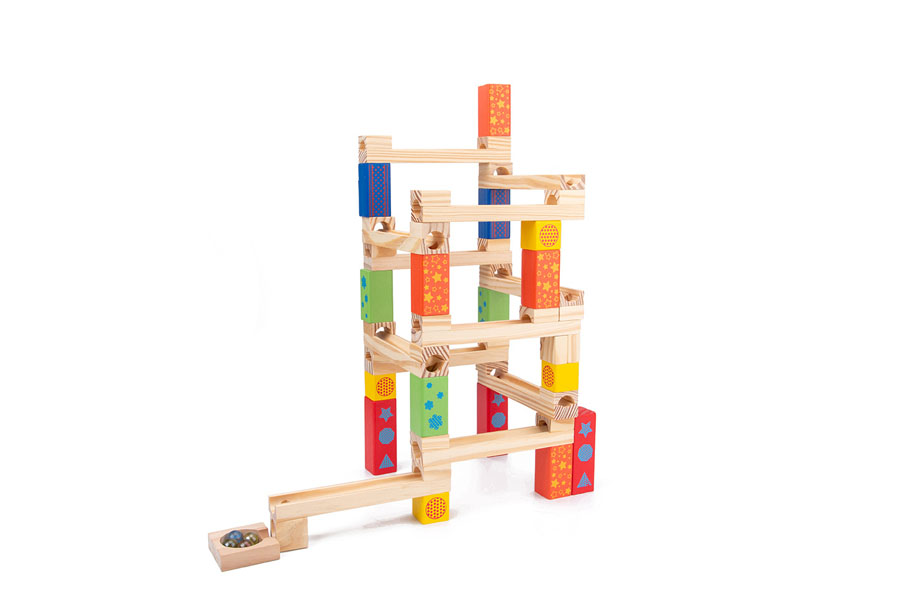 One child playing alone with a small marble run, and another image of three children working together on a large one.